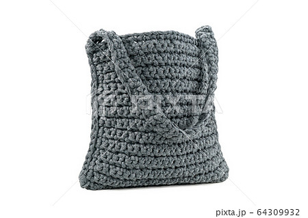 gray knitted handmade bag on white gray knitted handmade bag on white 64309932
