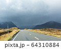 Open 2 lane road in rural countryside. Weather 64310884