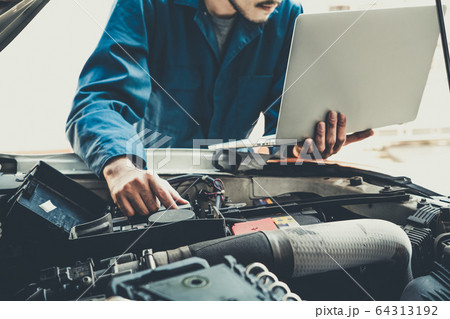 Professional mechanic providing car repair service Professional mechanic providing car repair service 64313192