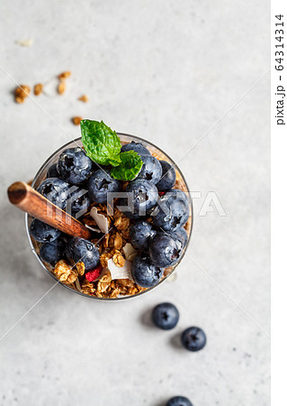 Breakfast in glass with granola and berries Breakfast in glass with granola and berries 64314314