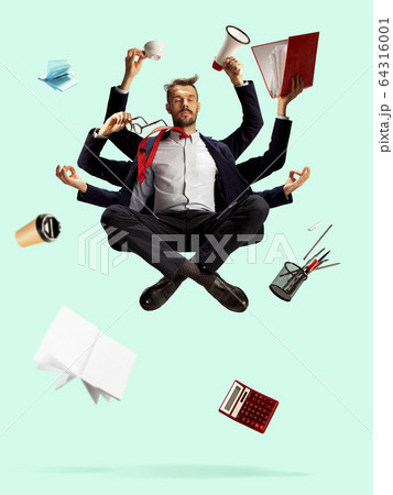 Young caucasian businessman, manager who manages everything, a lot of things and deals Young caucasian businessman, manager who manages everything, a lot of things and deals 64316001