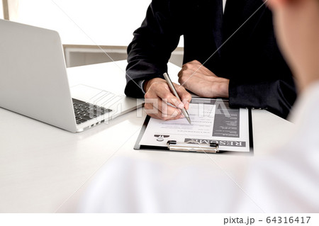 Business people hold a job profile and talk to job Business people hold a job profile and talk to job 64316417