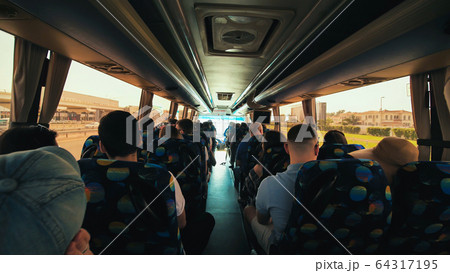 Tourist bus with tourists in Dubai. UAE. 64317195