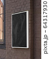Blank black glass rectangular poster mock up brick wall mounted Blank black glass rectangular poster mock up brick wall mounted 64317930