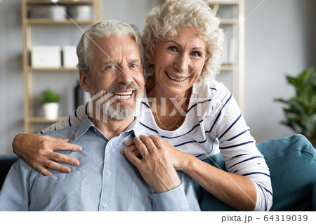 Head shot portrait smiling older wife and husband at home Head shot portrait smiling older wife and husband at home 64319039