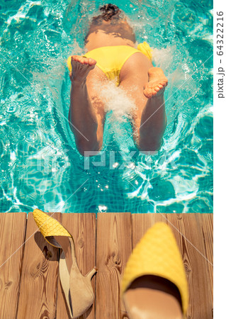 Woman having fun on summer vacation 64322216