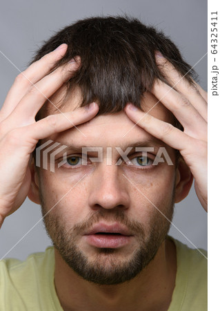 Close-up portrait of a sick man of European 64325411