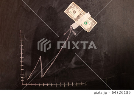 Dollar growth chart drawn on chalkboard. Investment concepts and interests Business growth. Rising graph made out of dollars. Dollar growth chart drawn on chalkboard. Investment concepts and interests Business growth. Rising graph made out of dollars. 64326189