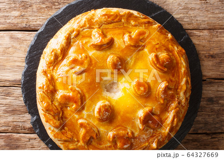 Homemade Russian pie Kurnik with chicken, potatoes Homemade Russian pie Kurnik with chicken, potatoes 64327669