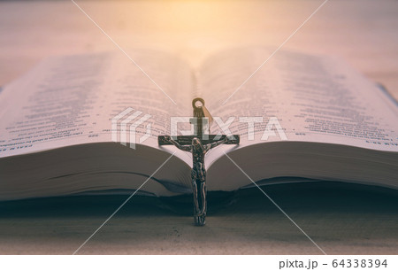 Christian man Bible study. Bible, books and guitar 64338394