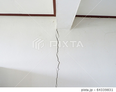 Earthquake damaged to the walls of the home.Cracked of wall from earthquake damage. Earthquake damaged to the walls of the home.Cracked of wall from earthquake damage. 64339831