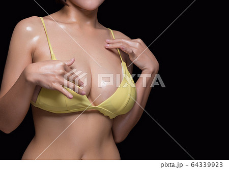 Close up of female big natural breasts. Isolated - Stock Photo [64339923] -  PIXTA