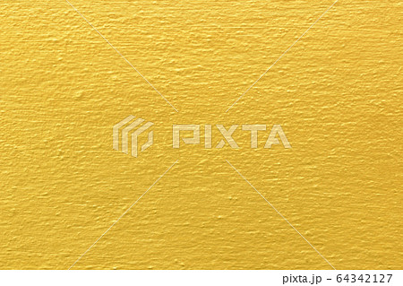 Gold paint on cement wall texture. Gold paint on cement wall texture. 64342127
