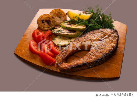 Fish steak with salad high angle view Fish steak with salad high angle view 64343287