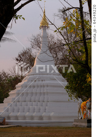 White Pagoda of Wat Phra That Chae Hang Temple, Nan Province, Thailand White Pagoda of Wat Phra That Chae Hang Temple, Nan Province, Thailand 64349220