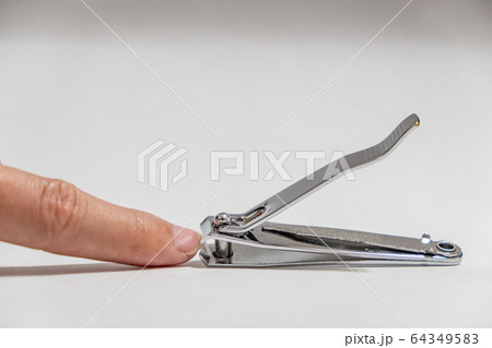 Finger prepare to cutting from old Nail clippers 64349583