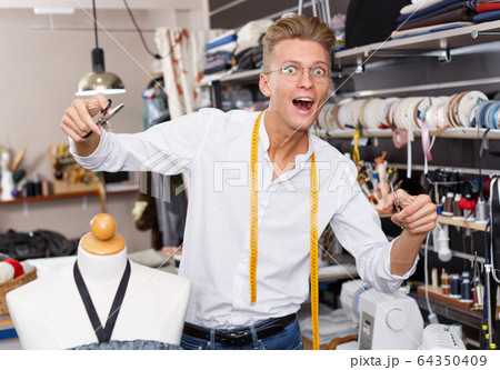 Portrait of cheerful male fashion designer Portrait of cheerful male fashion designer 64350409