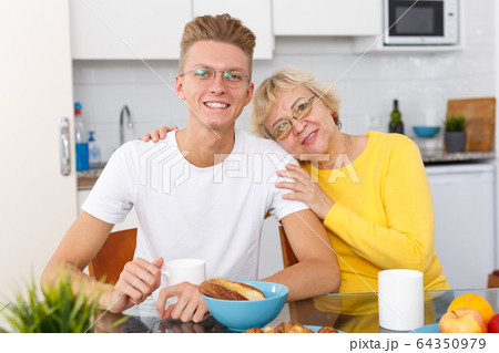 Woman and son spending time together Woman and son spending time together 64350979