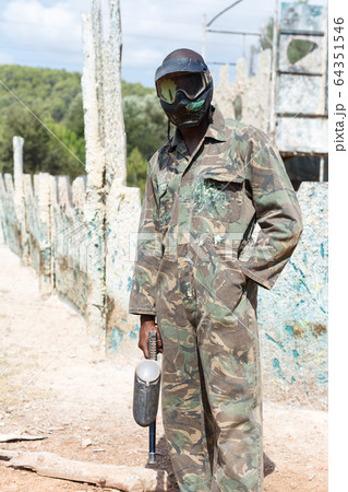 Paintball player after game Paintball player after game 64351546