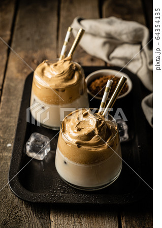 Coffee trend - dalgona coffee, whipped instant coffee 64354135