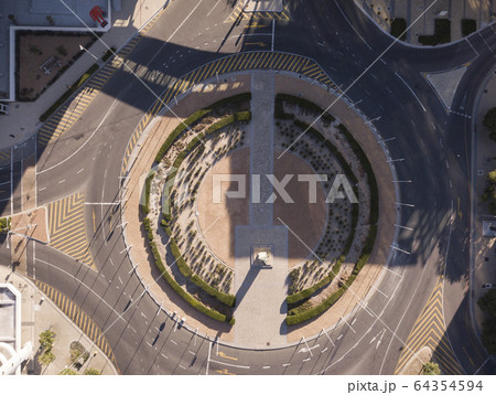 Aerial overhead empty traffic circle Aerial overhead empty traffic circle 64354594