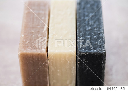 High angle close up of three bars of homemade bars of soap. 64365126
