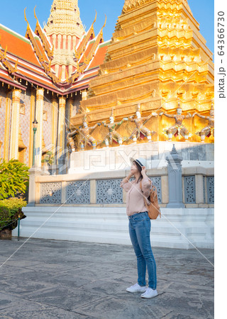 Beautiful asian tourist woman enjoy travel on Vacation in Bangkok at Thailand Beautiful asian tourist woman enjoy travel on Vacation in Bangkok at Thailand 64366730