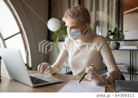 Woman worker in medical equipment work in office Woman worker in medical equipment work in office 64369311