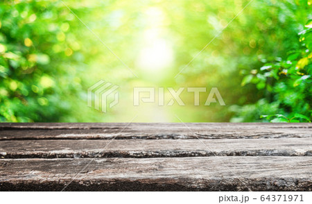 Empty old wooden table background Empty old wooden table background 64371971