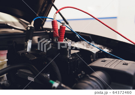 Selective focus charging car with electricity trough cables. Selective focus charging car with electricity trough cables. 64372460