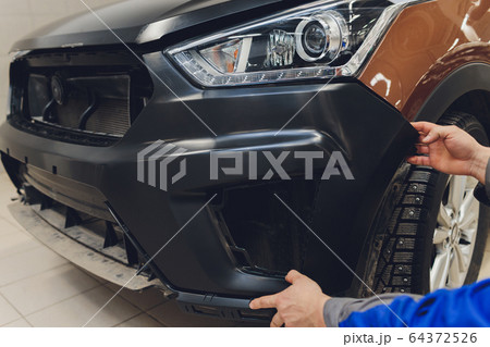 auto mechanic repair car body bumper replacement. auto mechanic repair car body bumper replacement. 64372526
