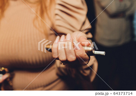 Modern hybrid cigarette device without burning tobacco, alternative smoking. Modern hybrid cigarette device without burning tobacco, alternative smoking. 64373714