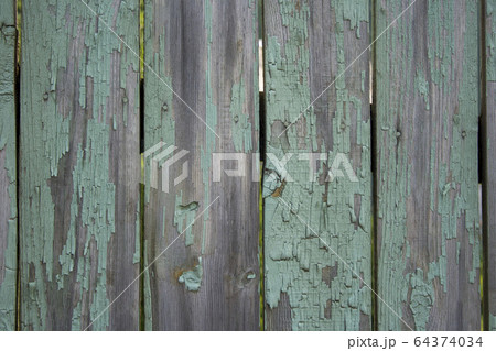 Old wooden fence shabby turquoise paint texture 64374034
