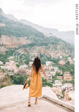 Caucasian tourist walking along the deserted streets of Europe. 64377199