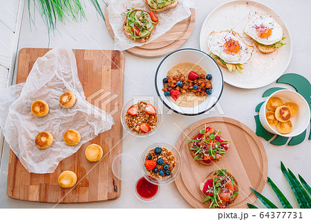 Healthy breakfast on the table on wooden desk 64377731