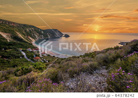 Beautiful summer sunset on Greece islands 64378242