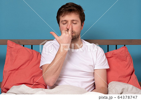 man breathing Alternate Nostril Breathing 64378747