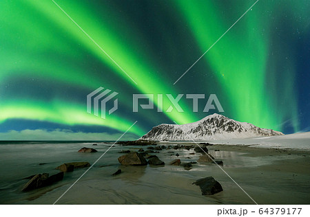 Aurora borealis also called northern lights over 64379177