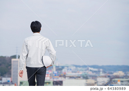 ビジネスマン 建設業 作業員 空 ビジネスイメージ ビジネスマン 建設業 作業員 空 ビジネスイメージ 64380989