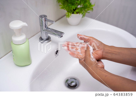 washing hand with hand wash foam washing hand with hand wash foam 64383859