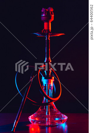 hookah shisha with coals on the table on a black background 64400562
