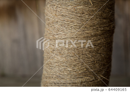 A roll of twine. Close-up. Selective focus. 64409165