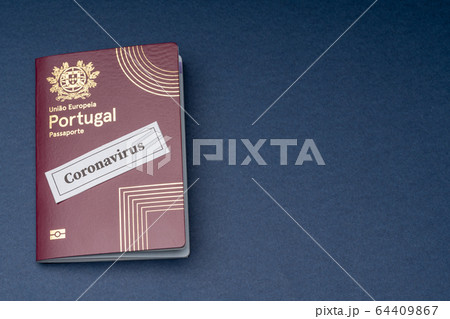 Portuguese European travel passport on a blue background. Portuguese European travel passport on a blue background. 64409867