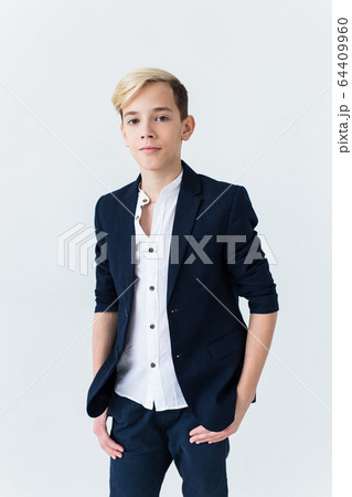 Teenage depression and puberty concept - Sad teenager portrait close up on white background. 64409960