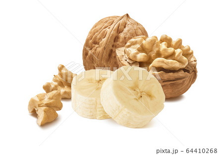 Walnut nuts and banana pieces isolated on white 64410268
