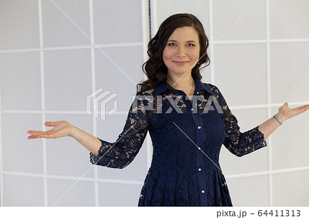 beautiful business woman Asia in a blue dress at work in the office beautiful business woman Asia in a blue dress at work in the office 64411313