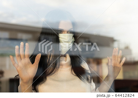 Young woman with veil, home isolation concept 64412824