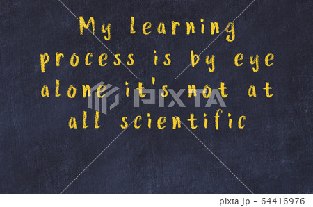 Chalk wise inscription on black chalkboard 64416976