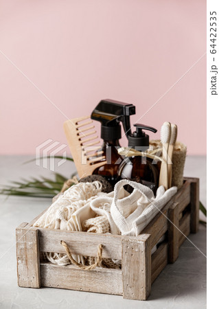 Zero waste beauty body care and house cleaning items on color paper background 64422535