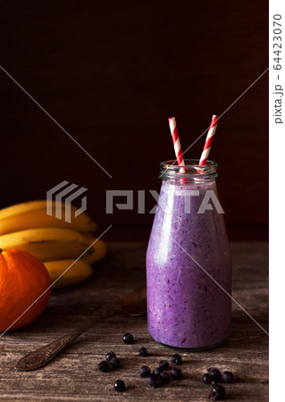 Organic smoothie made from bananas and berries 64423070